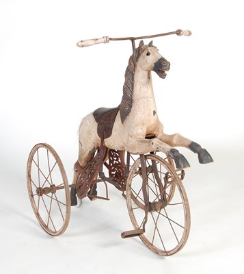 Lot 15 - A Victorian style merry-go-round carved wooden horse converted to a tricycle