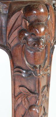 Lot 83 - A Chinese dark wood urn stand, Qing Dynasty