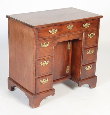 Lot 89 - A George III mahogany kneehole desk