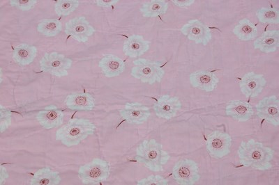 Lot 184 - A late 19th / early 20th century pink ground patchwork quilt