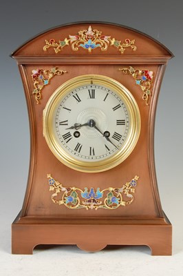 Lot 177 - A late 19th century French mantle clock with champleve enamel details