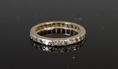 Lot 485 - A 20th century white metal and diamond set eternity ring