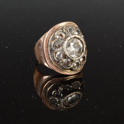 Lot 524 - A 20th century rose and white metal cubic zirconia cluster ring