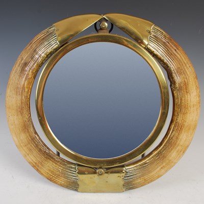 Lot 124 - An early 20th century bevelled glass wall mirror set in to a brass ships porthole