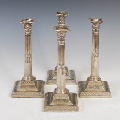 Lot 440 - A set of four early 19th century silver Neoclassical style Corinthian column candlesticks