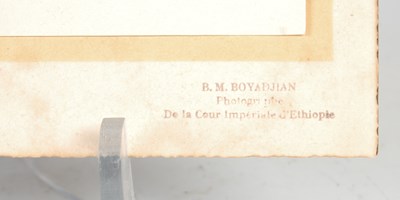 Lot 200 - A sepia toned portrait photograph of Haile Selassie 1892-1975