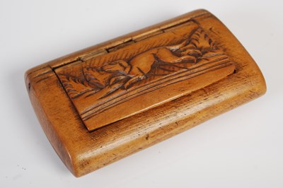 Lot 215 - A treen rounded oblong snuff box with integral hinge