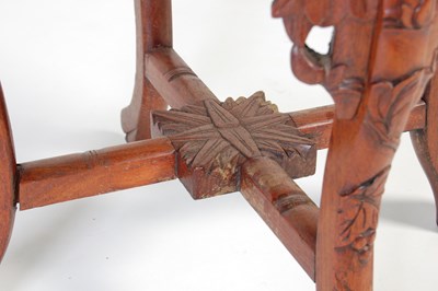 Lot 8 - A Chinese dark wood urn stand, early 20th century