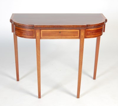 Lot 70 - A George III mahogany and satinwood banded breakfront tea table