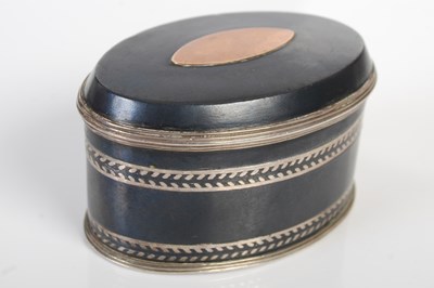 Lot 221 - A patinated copper oval snuff box