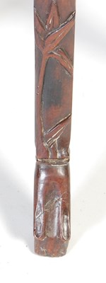 Lot 44 - A Chinese dark wood urn stand, Qing Dynasty