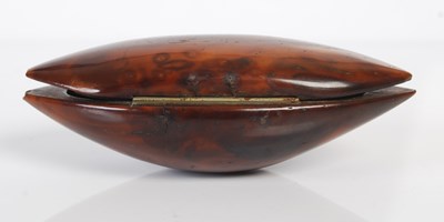 Lot 248 - A coquilla nut shuttle-shaped snuff box