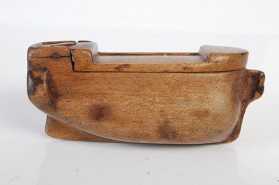 Lot 265 - A treen snuff box carved in the form of a Man o’ War ship