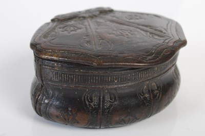 Lot 268 - A pressed leather cartouche-shaped snuff box