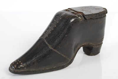 Lot 274 - A leather snuff box in the form of a shoe