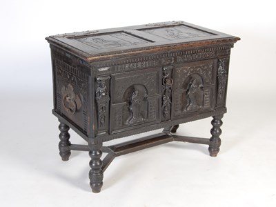 Lot 5 - An antique stained oak coffer on integral...