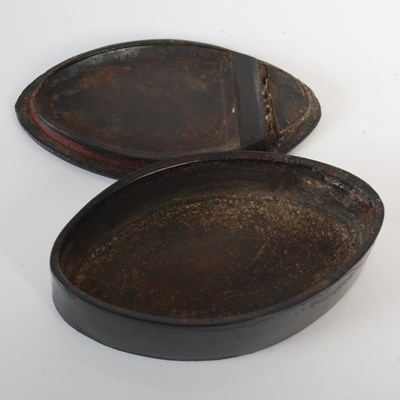 Lot 304 - A pressed leather navette-shaped snuff box