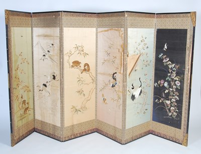 Lot 1052 - A Chinese six-fold embroidered silk screen,...