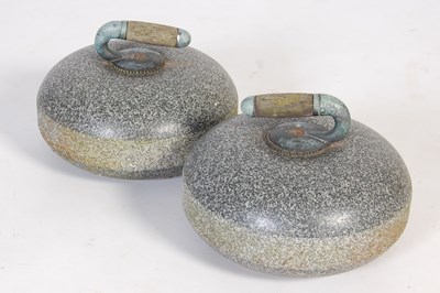 Lot 175 - A pair of vintage granite curling stones