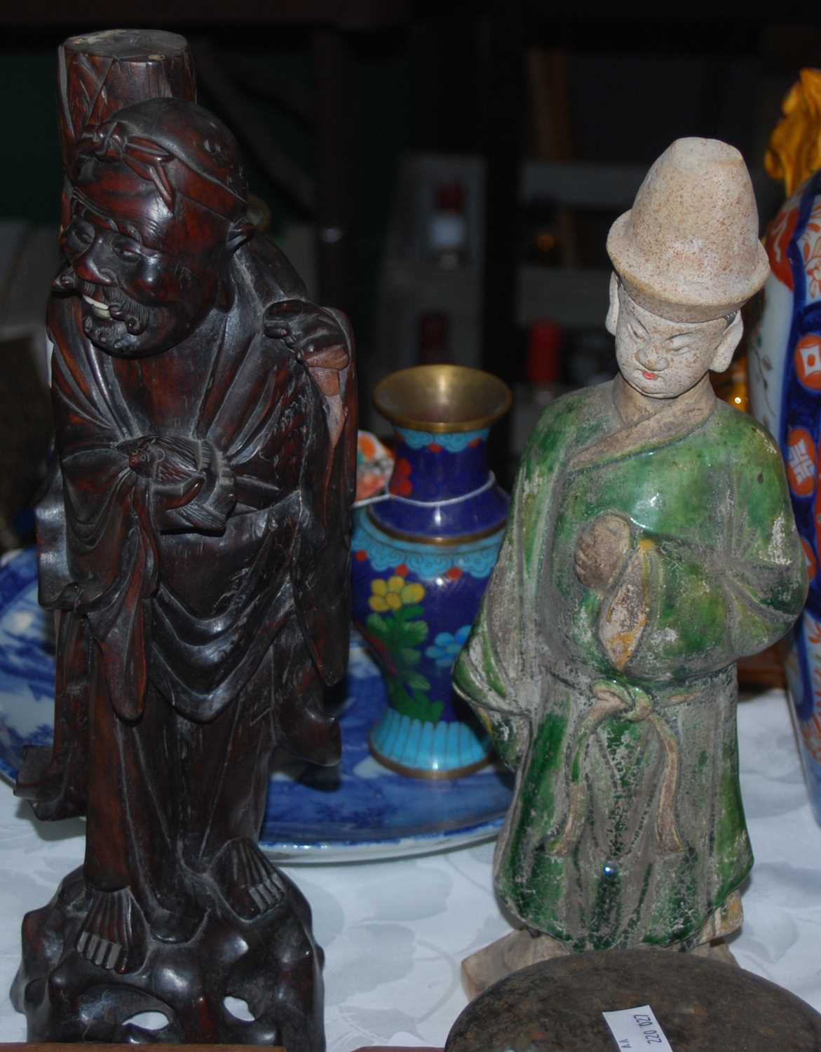 Lot 375 - A Chinese pottery nodding head figure of a...