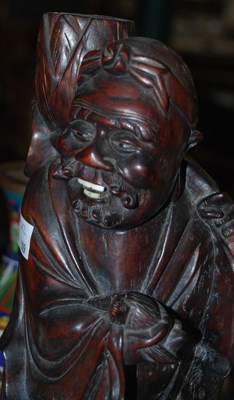 Lot 375 - A Chinese pottery nodding head figure of a...