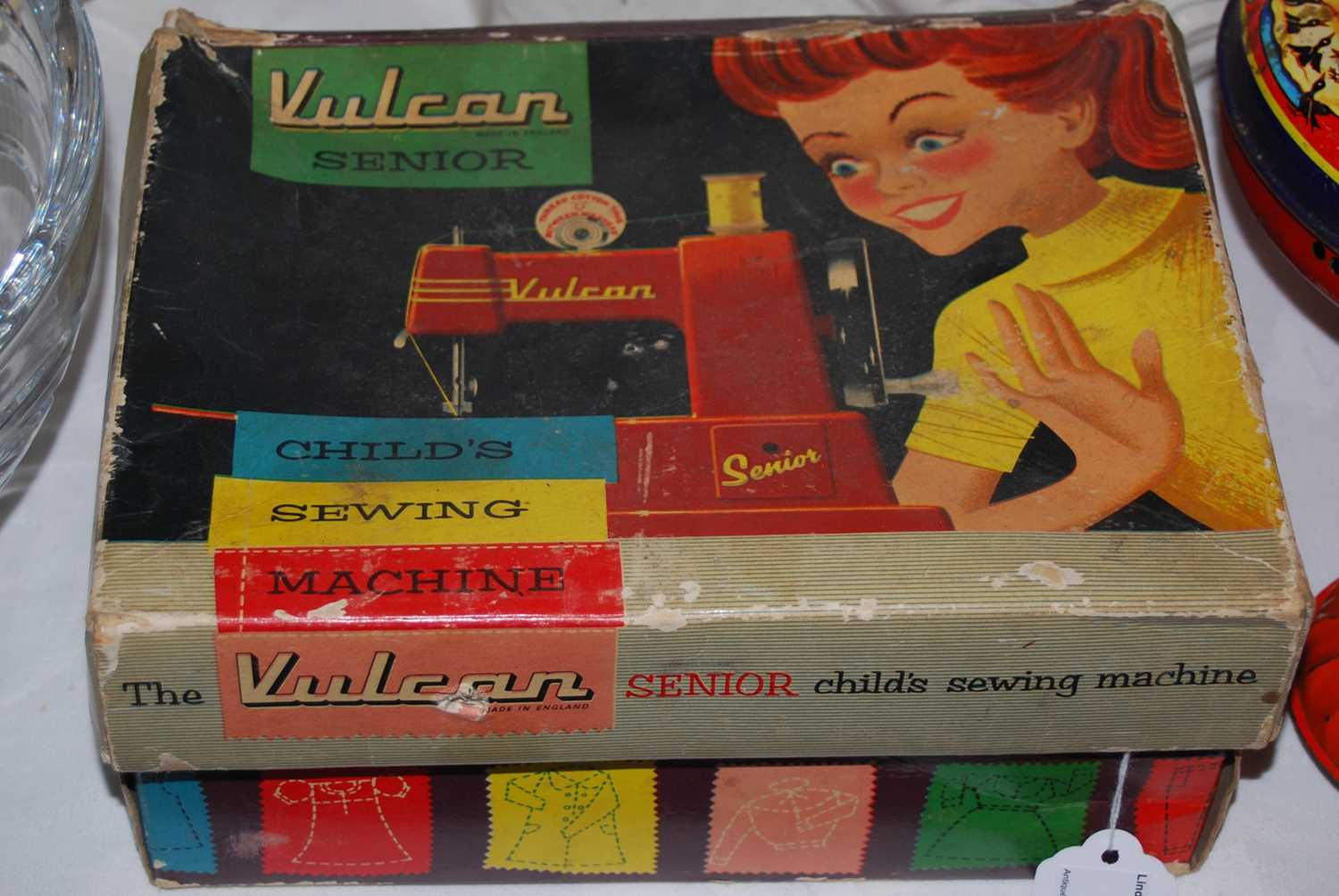 Lot 447 - A 'Vulcan Senior' childs sewing machine in...