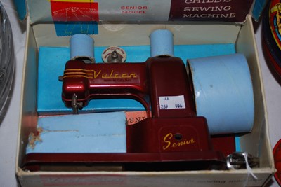 Lot 447 - A 'Vulcan Senior' childs sewing machine in...