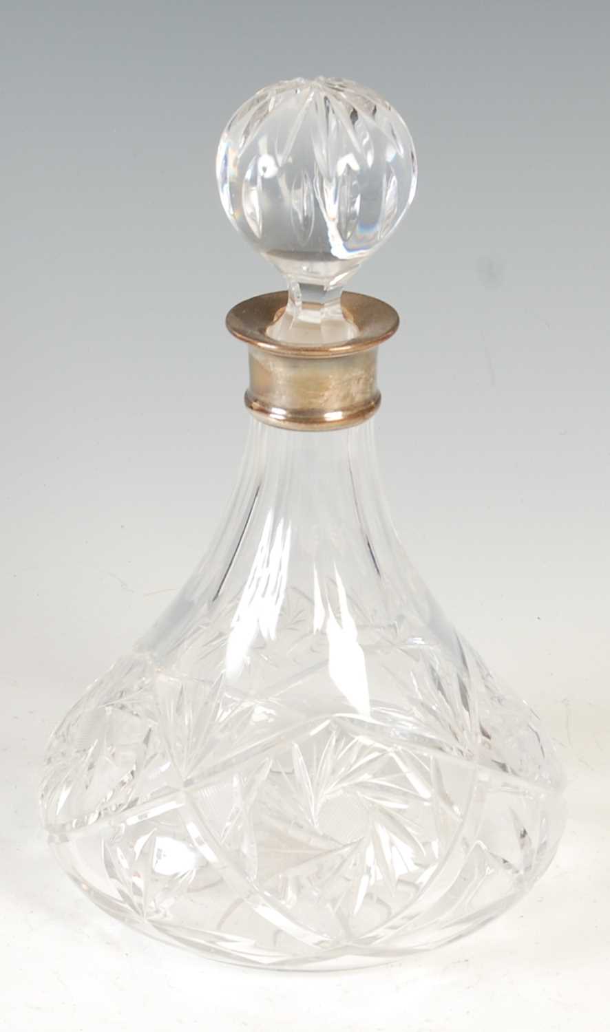 Lot 403 - A modern silver mounted cut-glass decanter and...