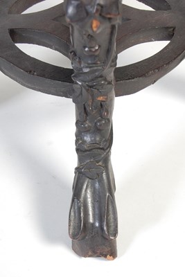 Lot 9 - A Chinese dark wood urn stand, Qing Dynasty,...