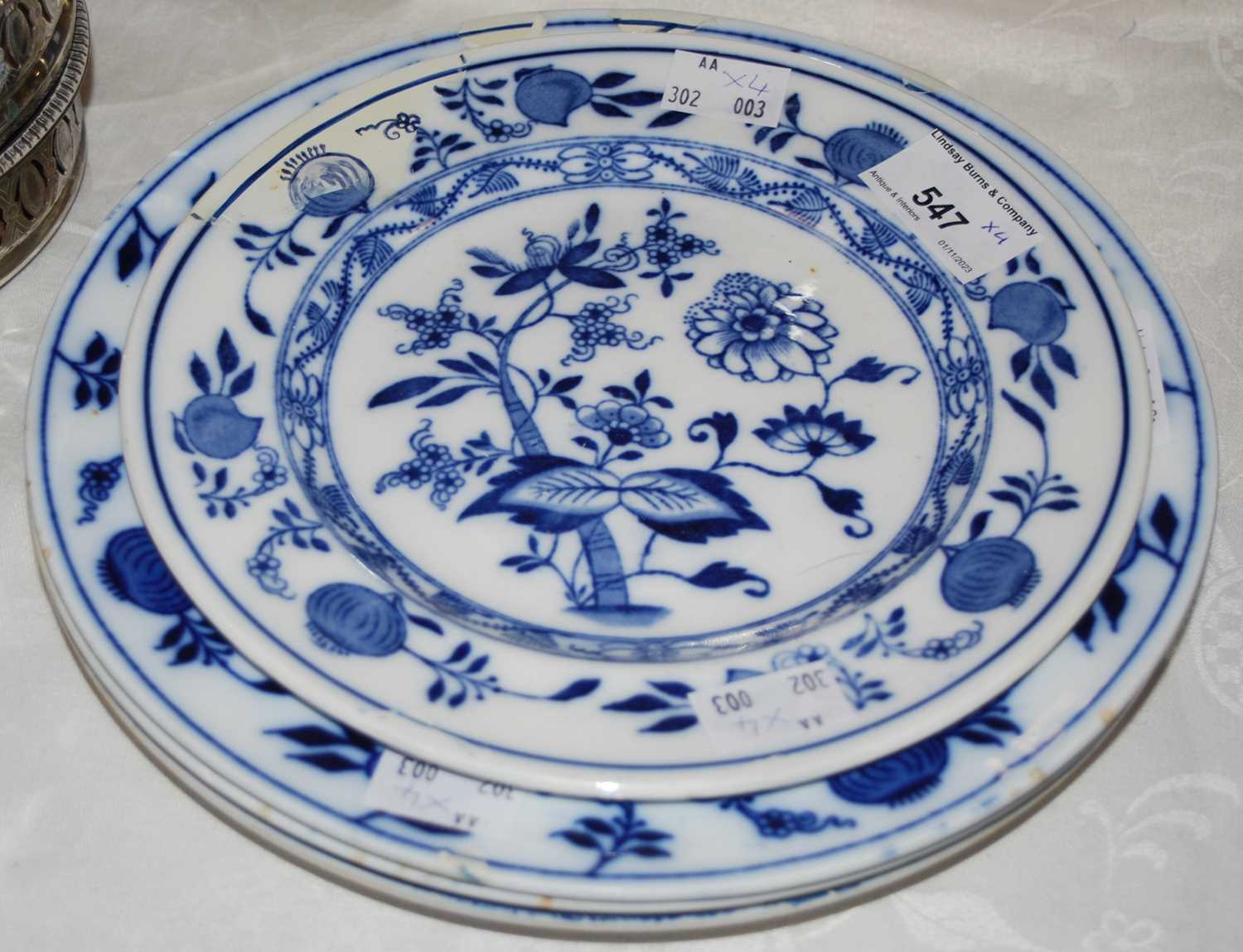 Lot 547 - A group of four blue and white cabinet plates...