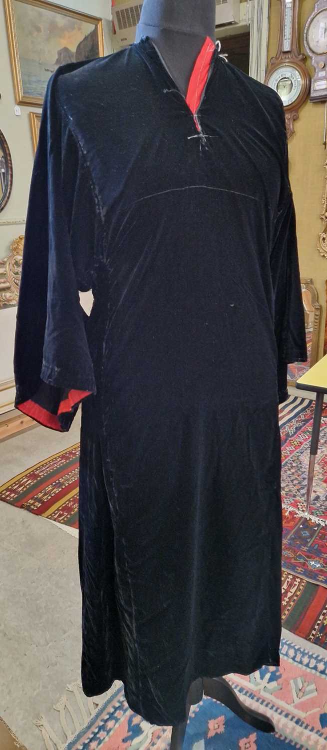 Lot 584 - An East European black velvet robe.