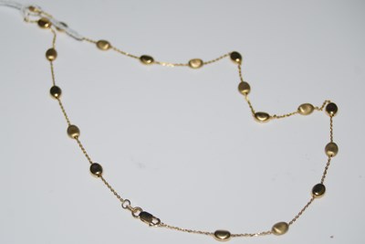 Lot 68 - A yellow metal necklace stamped '375' set with...