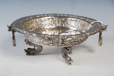 Lot 116 - An Eastern white metal twin handled bowl,...
