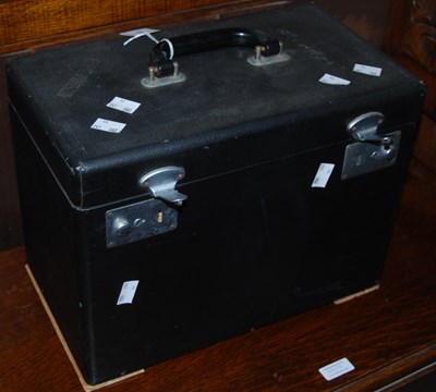 Lot 872 - A vintage cased Singer sewing machine, the...