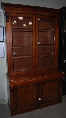 Lot 885 - A Victorian mahogany glazed two part bookcase,...