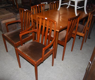 Lot 887 - A mid-century teak Meredew extending dining...