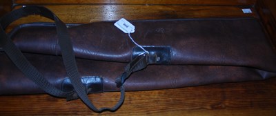 Lot 896 - A vintage brown leather rifle case by Gunmark,...