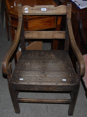 Lot 902 - A 19th century Scottish oak elbow chair.