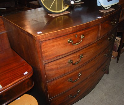 Lot 911 - A 19th century mahogany bowfront chest of two...