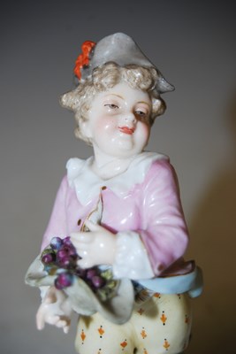 Lot 203 - A pair of Continental porcelain figures, boy...