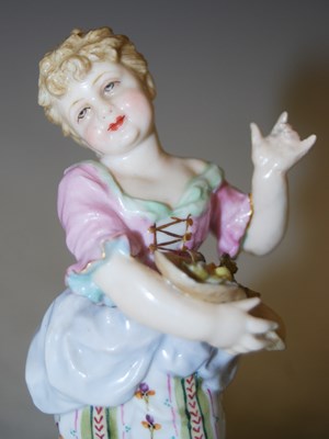Lot 203 - A pair of Continental porcelain figures, boy...
