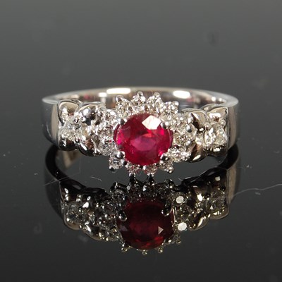 Lot 448 - A white metal, South African ruby and diamond...
