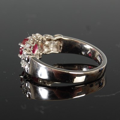 Lot 448 - A white metal, South African ruby and diamond...