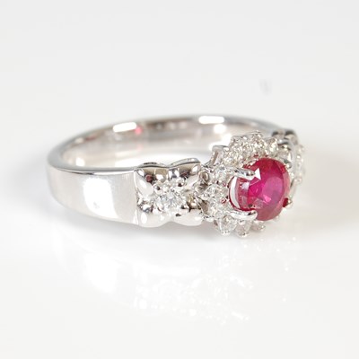 Lot 448 - A white metal, South African ruby and diamond...
