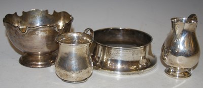 Lot 170 - A collection of silver to include; a London...