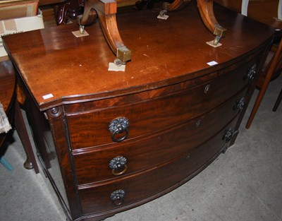 Lot 915 - A mahogany bowfront chest of three long...