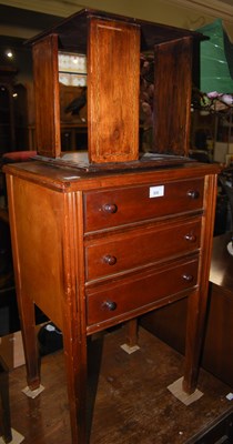 Lot 930 - A mahogany three drawer sewing side table,...