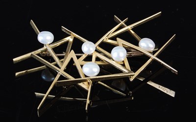 Lot 455 - An 18ct gold and pearl Modernist brooch, with...