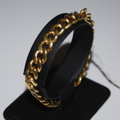 Lot 77 - A yellow metal bracelet, unmarked but tests as...