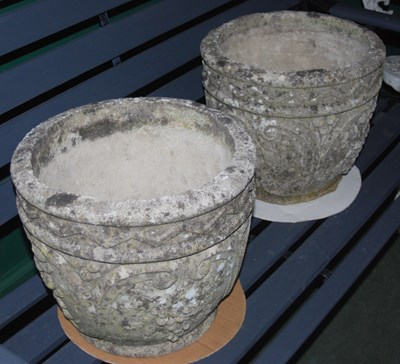 Lot 955 - A pair of reconstituted stone garden planters,...
